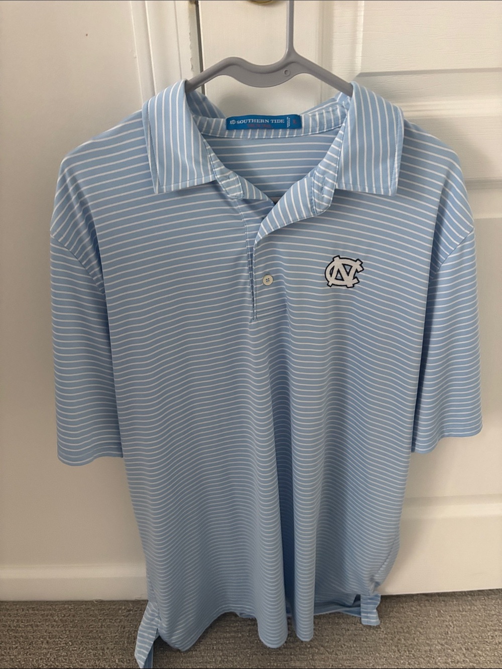 Southern Tide Light Blue Striped Polo with UNC Logo
